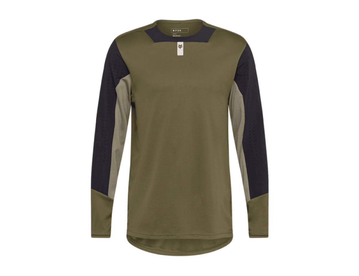Fox Racing Defend long sleeve MTB jersey in olive green, with black perforated shoulder and sleeve panels and a small Fox logo tab at the chest.