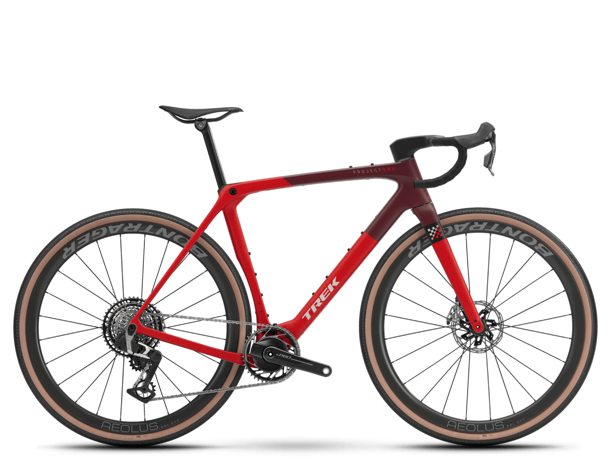 Trek Checkmate SLR 9 AXS gravel bike in radioactive red and sedona red