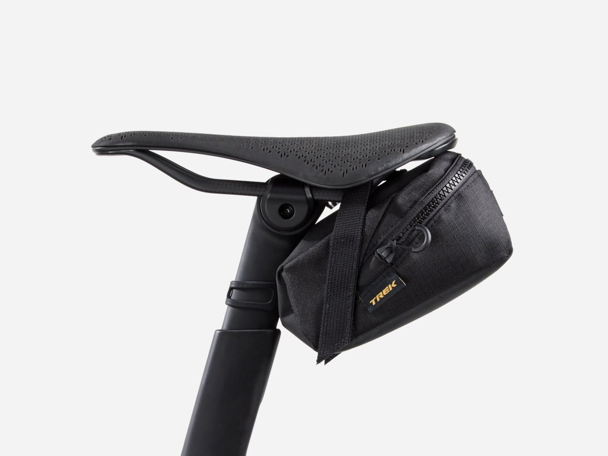 Black Trek saddle bag mounted under a bike saddle